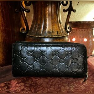 Gucci Black Embossed Leather Zip Wallet